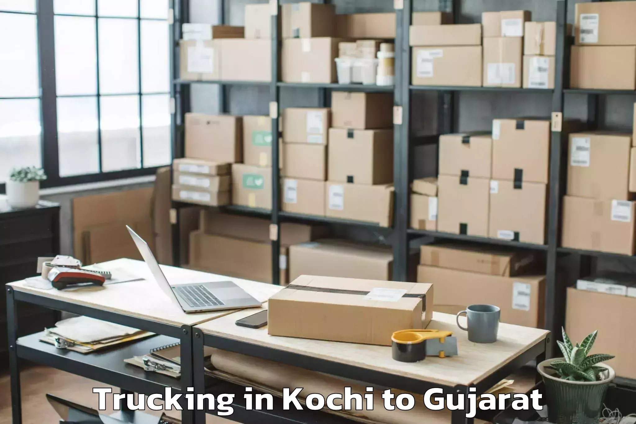 Leading Kochi to Umarpada Trucking Provider